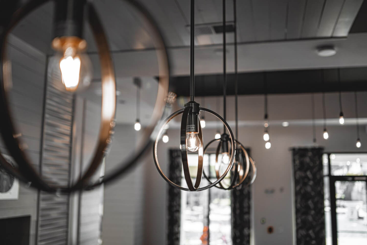 selective-focus-shot-modern-lamp-with-light-bulb-inside-building (1)